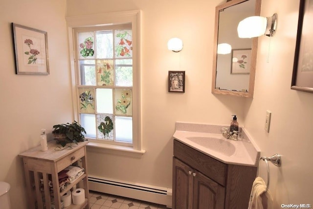 bathroom featuring vanity and a baseboard radiator