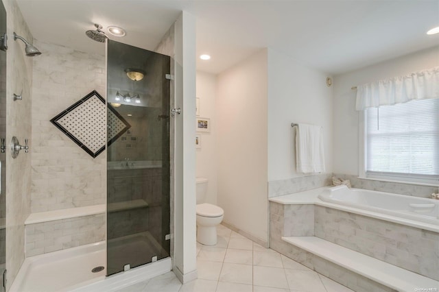 bathroom featuring tile patterned flooring, plus walk in shower, and toilet