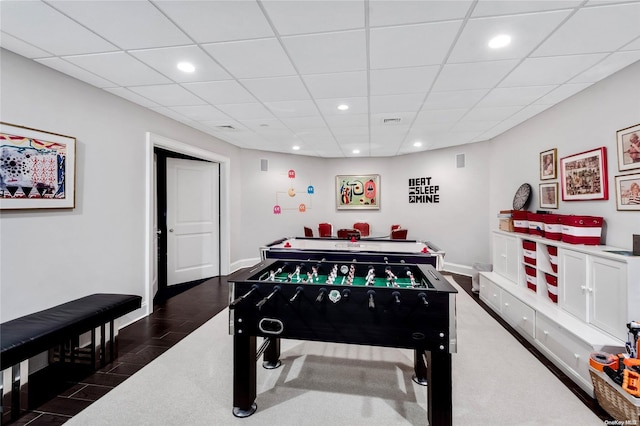 playroom featuring a paneled ceiling