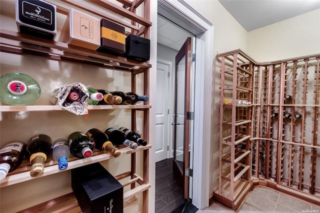 wine room featuring tile patterned flooring