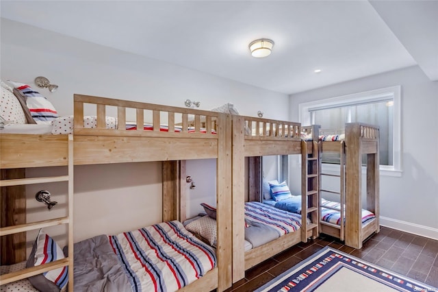 bedroom featuring dark wood-type flooring