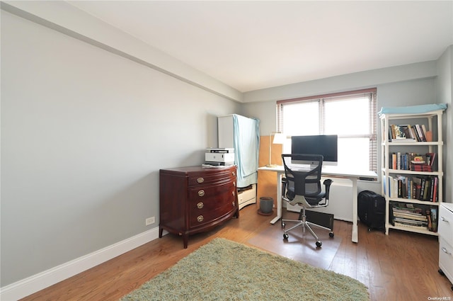 office area with light wood-type flooring