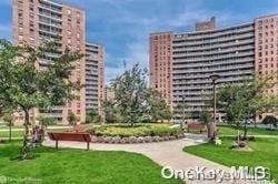 view of home's community featuring a yard