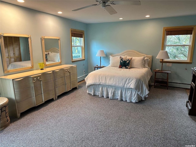 bedroom with carpet floors, multiple windows, and ceiling fan