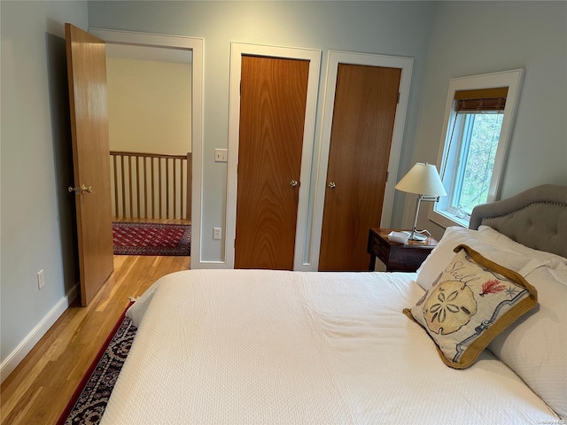 bedroom with light hardwood / wood-style floors