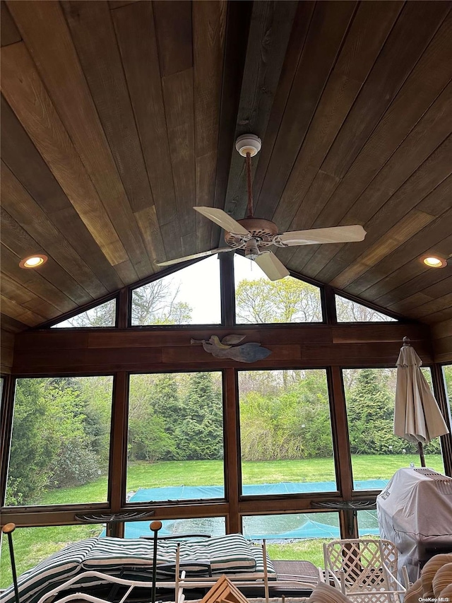 room details featuring ceiling fan and wood ceiling