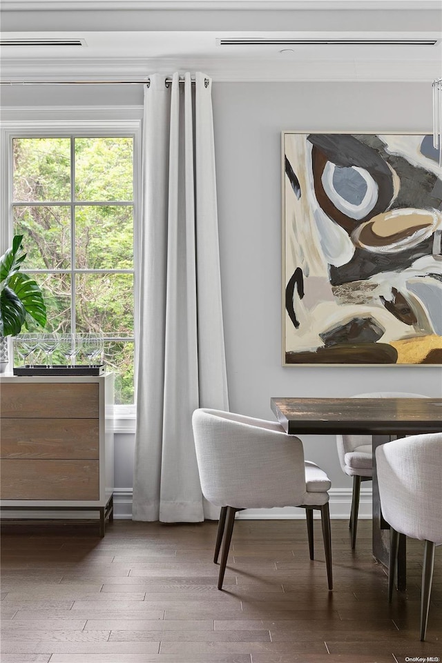 dining room with hardwood / wood-style floors