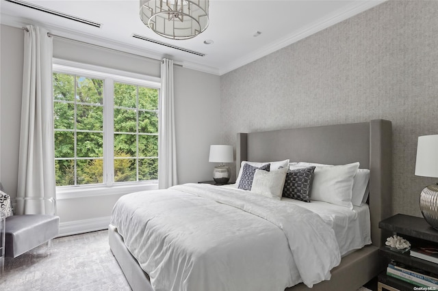 bedroom with crown molding