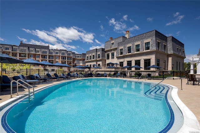 view of pool featuring a patio