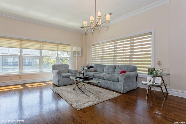 living room featuring ornamental molding, dark wood-type flooring, and an inviting chandelier