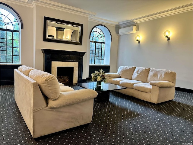 carpeted living room with a wall unit AC, crown molding, and a fireplace