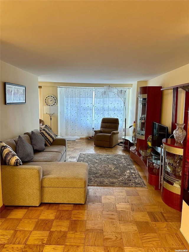 living room featuring light parquet flooring