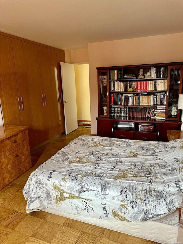 bedroom with wooden walls