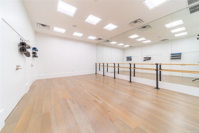 unfurnished room featuring light hardwood / wood-style floors