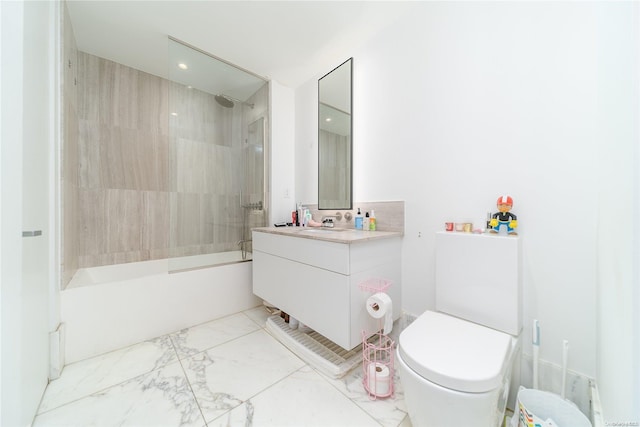 full bathroom with vanity, toilet, and tiled shower / bath