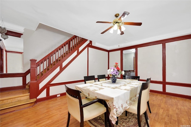 dining room featuring ceiling fan and light hardwood / wood-style floors