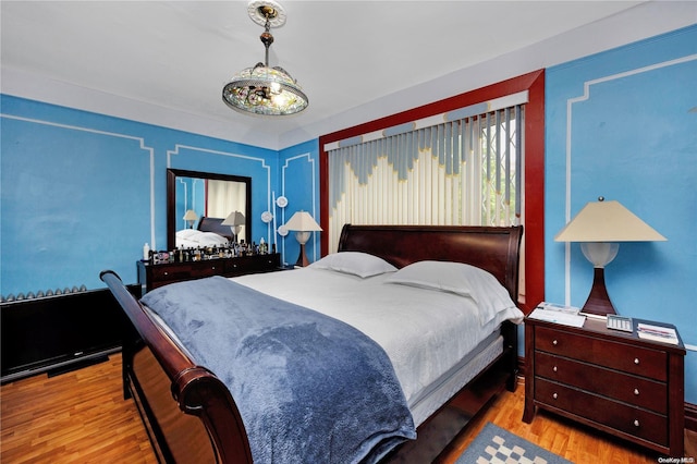 bedroom featuring light hardwood / wood-style floors