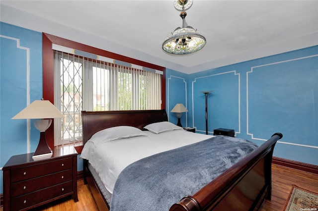 bedroom featuring light hardwood / wood-style flooring