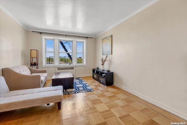 sitting room featuring crown molding, radiator, and light parquet floors