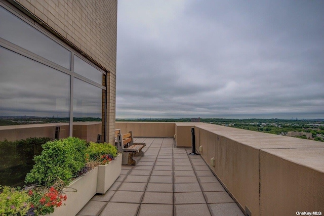 view of patio / terrace with a balcony