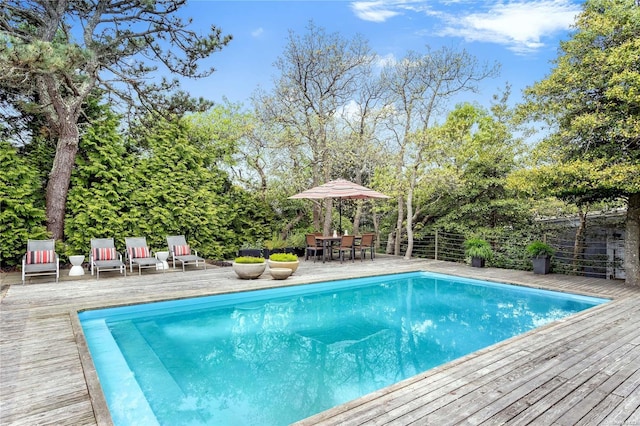 view of pool with a deck