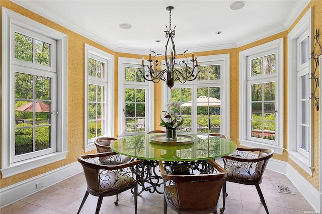 sunroom with an inviting chandelier