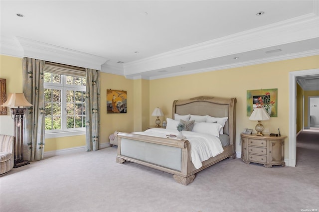 bedroom featuring crown molding and carpet