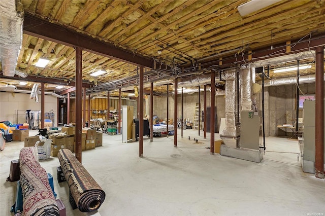 basement with white fridge