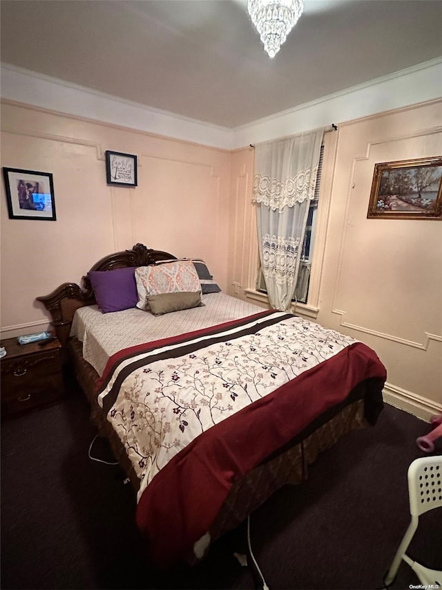 bedroom with a chandelier and ornamental molding