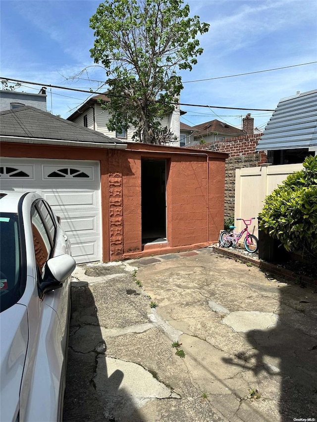 exterior space with a garage