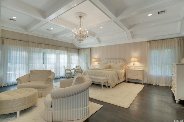 bedroom with a chandelier, hardwood / wood-style floors, beamed ceiling, and coffered ceiling