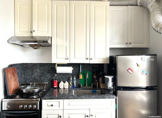 kitchen featuring decorative backsplash, ventilation hood, white cabinets, stainless steel refrigerator, and black / electric stove