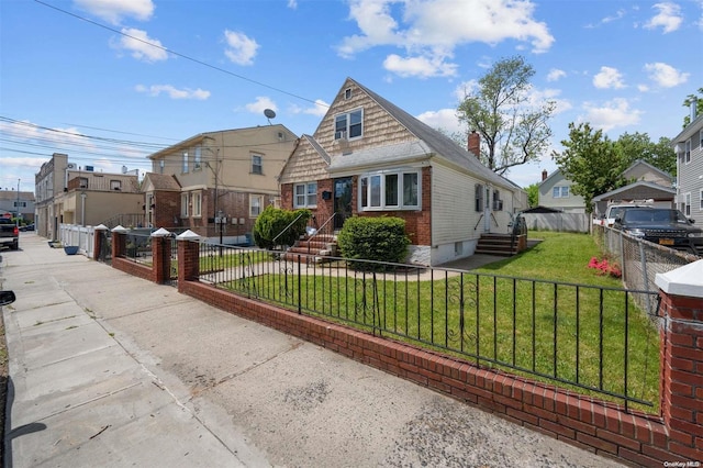 view of front of home featuring a front yard