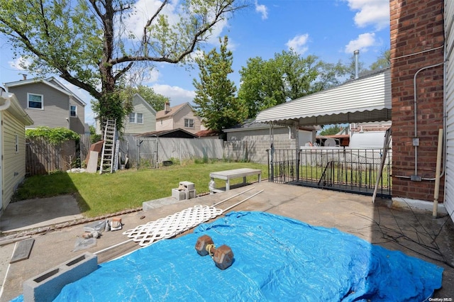 view of pool featuring a yard and a patio