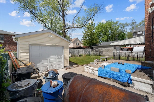 exterior space with an outbuilding, a yard, and a garage