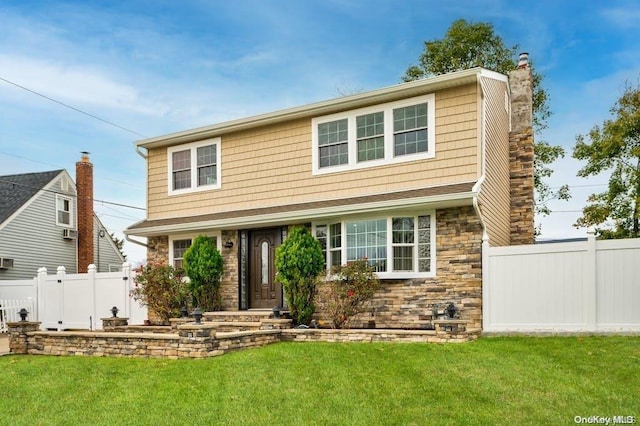 view of front of property featuring a front lawn