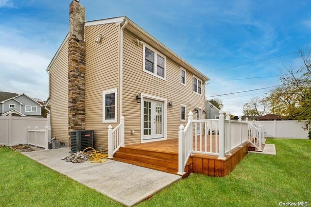 6 George Ave, Hicksville, NY 11801 - rear view of property featuring a wooden deck, french doors, and a chimney