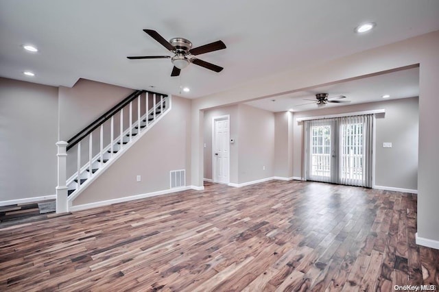 6 George Ave, Hicksville, NY 11801 - unfurnished living room featuring a ceiling fan, wood finished floors, stairway, and recessed lighting