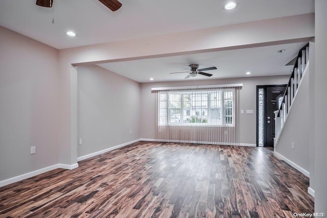 6 George Ave, Hicksville, NY 11801 - unfurnished living room with a ceiling fan, dark wood-type flooring, recessed lighting, and stairway
