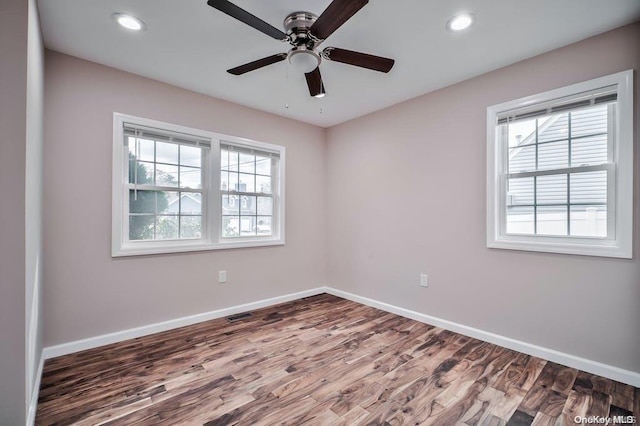 6 George Ave, Hicksville, NY 11801 - unfurnished room featuring wood finished floors, a ceiling fan, and recessed lighting