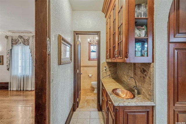 interior space featuring sink and light hardwood / wood-style flooring