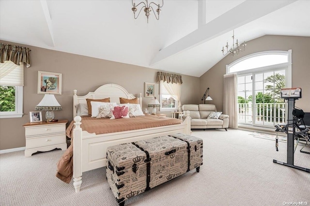 bedroom with a chandelier, light colored carpet, and multiple windows