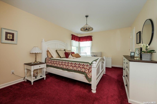 bedroom with dark carpet