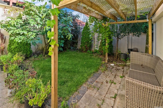 view of yard with a pergola