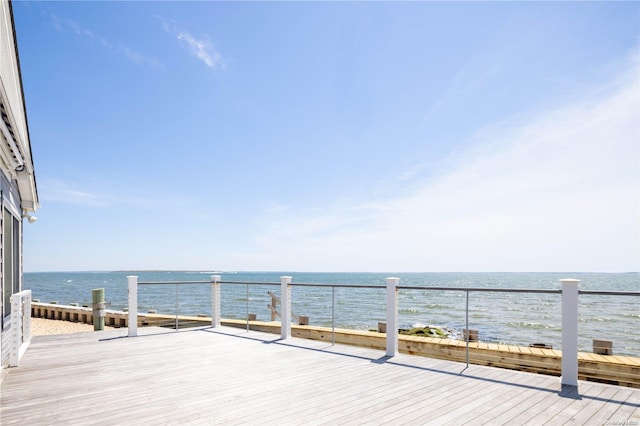 wooden terrace with a water view