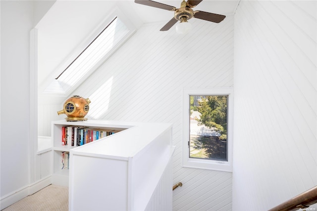 room details with ceiling fan and wooden walls