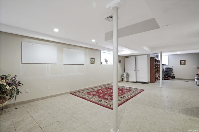 basement featuring plenty of natural light