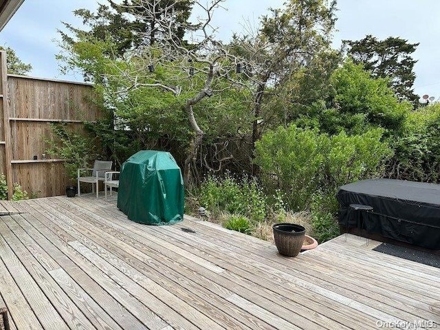 wooden deck with area for grilling