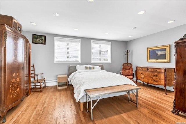 bedroom with light hardwood / wood-style floors