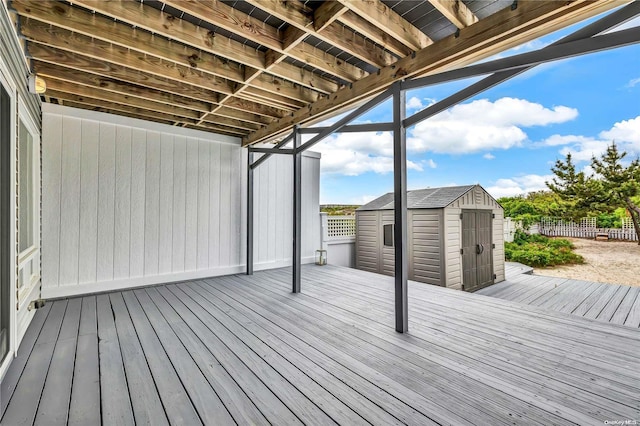 deck featuring a shed